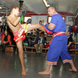 How to Choose and Hold Focus Mitts and Thai Pads Safely